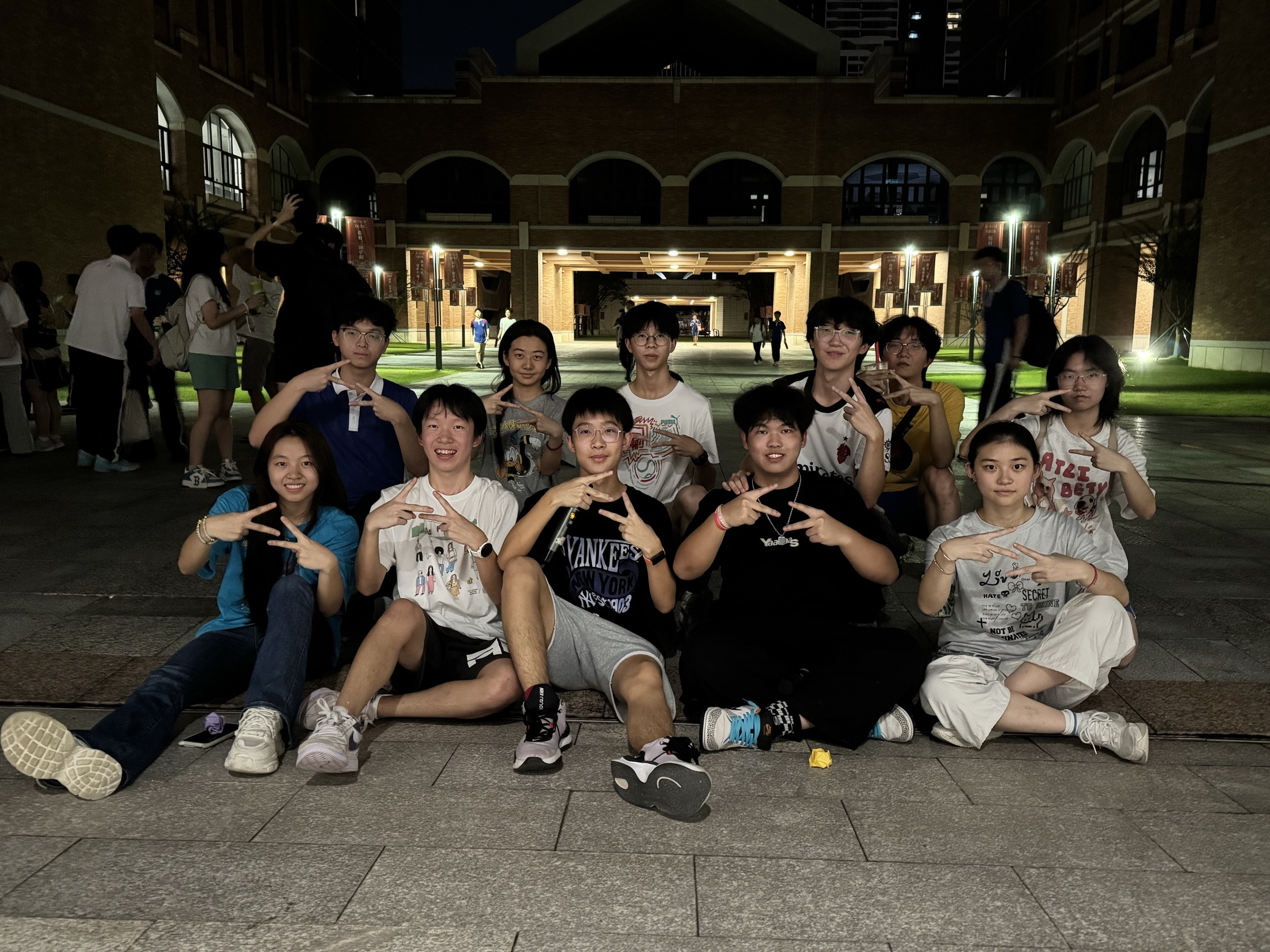 Hip-Hop group photo on campus at night